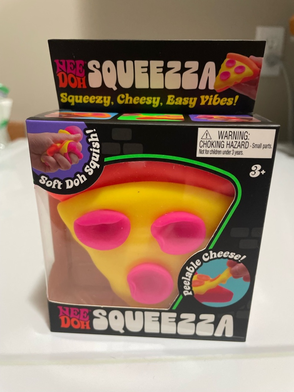 NeeDoh Squeezza Pizza Slice Squishy Toy